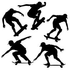 Silhouettes of skateboarders in action