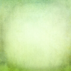Soft green watercolor texture with gentle gradient and vintage grunge effect, dreamy abstract background ideal for spring designs, invitations, scrapbooking, posters, and graphic projects.