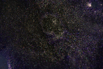 Dark cosmic dust texture with purple tones