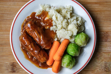 Classic Bangers And Mash With Carrots and Brussel Sprouts Vegetables