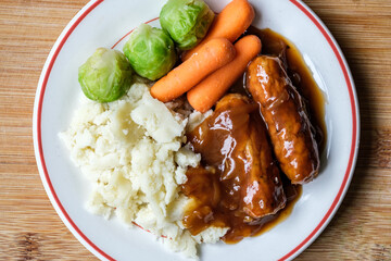  Classic Bangers And Mash With Carrots and Brussel Sprouts Vegetables
