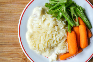 Traditional Tasty Baked Fish Pie With Carrots And Runnner Beans