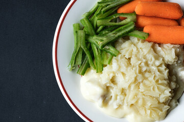 Traditional Tasty Baked Fish Pie With Carrots And Runnner Beans