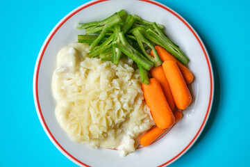Traditional Tasty Baked Fish Pie With Carrots And Runnner Beans