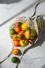 citrus fruits in a mesh bag