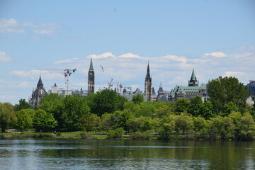 Ottawa river with the parliament building in the background on a sunny spring day