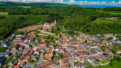Panoramic aerial of the old town of the city Lucens in Switzerland on a sunny noon in summer