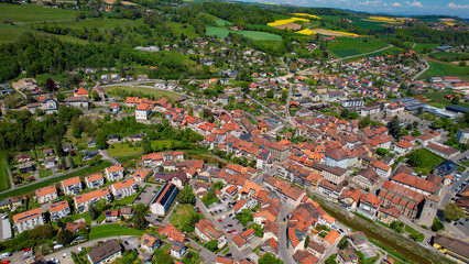 Panoramic aerial of the old town of the city Moudon in Switzerland on a sunny noon in summer