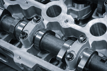 car engine disassembled, auto service concept background blue tone