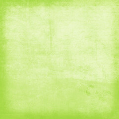 Bright green grunge textured background with faded center and distressed edges. Ideal for nature-themed designs, posters, invitations, scrapbooking, and digital art projects.