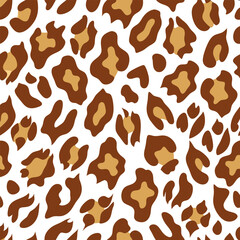 Seamless pattern with animal print in warm beige tones. Creamy colored deer skin design background with irregular textured spots for textiles, wallpapers, wrapping paper, fabric.