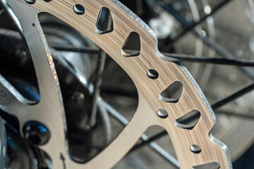 Bicycle gears resemble a sculpture in this macro image of a wheel