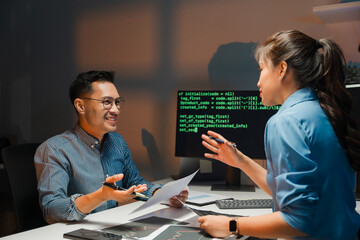 Software Developers Collaborating on Code Review