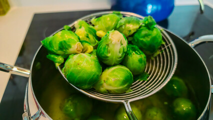 Freshly boiled Brussels sprouts served with lemon