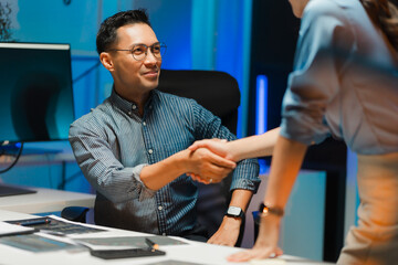 Business Handshake in Modern Office