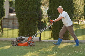 man mowing lawn