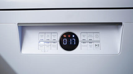 close up of dishwasher indicator