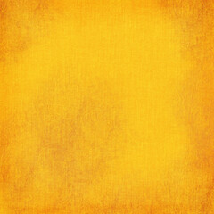 Obraz premium Vibrant golden yellow textured background with subtle distressed details and warm vintage tones. Ideal for posters, invitations, digital art, autumn themes, and bold graphic design projects.