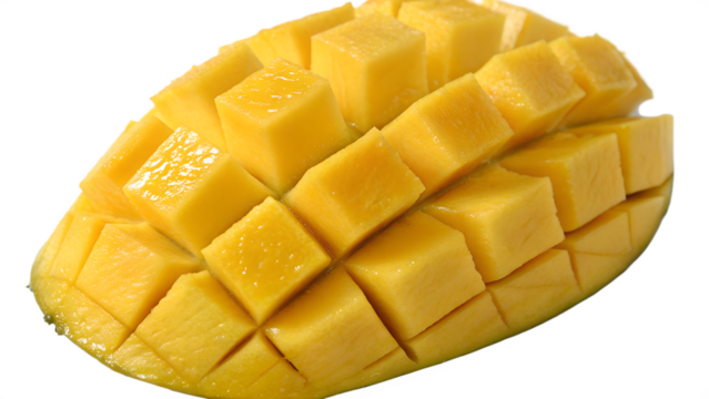 A close-up view of a ripe mango half, neatly cut into a grid pattern of yellow cubes. The vibrant yellow flesh of the mango is visible, suggesting its juiciness.