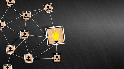 Teamwork and creative idea development. Brainstorming. Creative collaboration in business. Team members connect with idea light bulb symbol on wooden cubes.