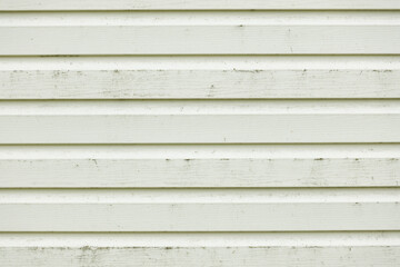 Abstract texture of a white wall with horizontal lines. 