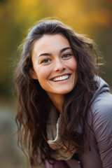 Young woman outdoors, smiling