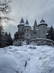 View of Castel Savoia during winter, a medieval-style castle and holiday residence of Queen Margherita of Savoy, Gressoney-Saint-Jean, Aosta Valley, Italy
