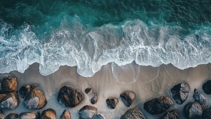 Aerial view of a beach with waves crashing
