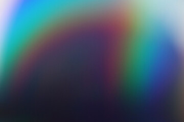 Soft focus rainbow neon grain blur texture wall with prism refraction. Light and shadow smoke...