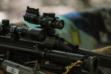 Close-Up of Assault Rifle Stock and Sight in Colombian Jungle
