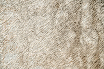 Antique ancient stone wall masonry texture background. Old wall made of beige stone blocks 