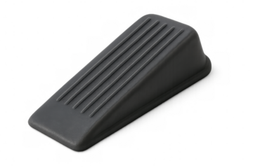 Gray rubber door stop wedging securely, preventing unwanted door movement with simple, functional design against clean transparent backdrop