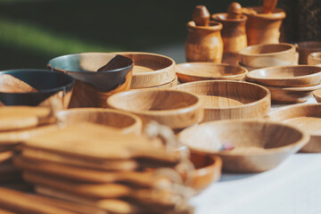Woodworking wonders at the autumn harvest festival, with hand carved bowls and vessels shining...