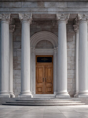 Fototapeta premium Grand stone columns, wooden door, neoclassical architecture, marble steps, historic building entrance