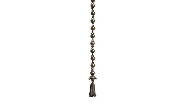 Ceiling fan pull chain with metal beads and decorative end isolated  