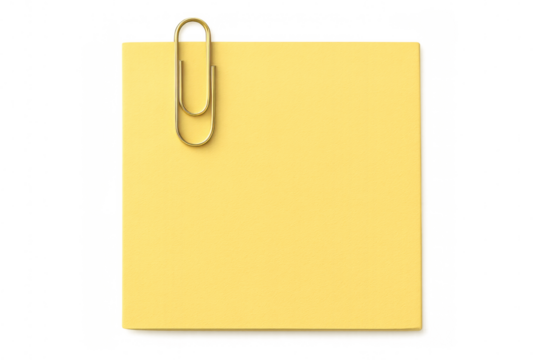Yellow sticky note with golden paperclip fastened, resting on transparent surface, offering blank writing area for custom messaging