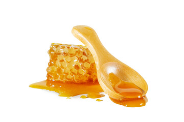 Honeycombs with wooden spoon isolated on white background.
