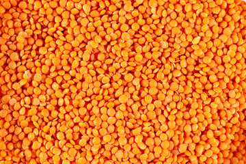 Red lentils, food background. Top view.