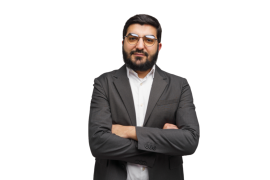 A man in a grey suit strikes a poised pose, crossing his arms against a stark white backdrop, embodying sheer self-assurance