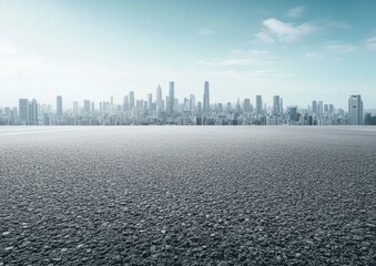 Empty asphalt parking lot with a city skyline