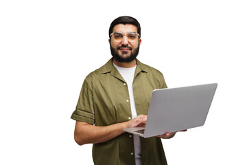 Man in a green shirt smiles while holding an open laptop, fingers poised over the keys, ready to...
