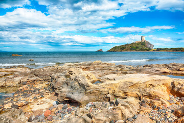 Fabulous view on Ancient Spanish tower of Coltellazzo of Saint Efisio lighthouse at Nora...