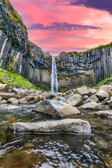 Impressive view of Svartifoss waterfall with basalt columns on southern part of Iceland.