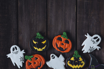 Mock up. Copy space for text. Assortment of Halloween gingerbread cookies: spiders, ghosts,...