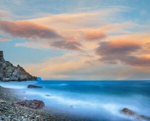 Amazing view of the beach and rocks shot with a long exposure.