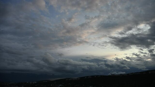 An early summer evening, unstable skies, and crossing clouds, Oslo, Norway, 4K, 30fps