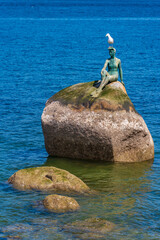 Girl in a Wetsuit, a bronze sculpture at Stanley Park in Vancouver, Canada