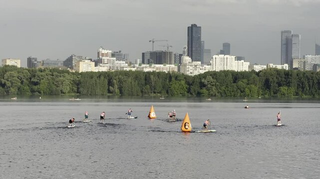 SUP boarders training on the water, competitions, Stroginsky Zaton, Moscow