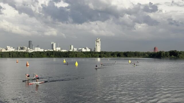 SUP boarders training on the water, competitions, Stroginsky Zaton, Moscow