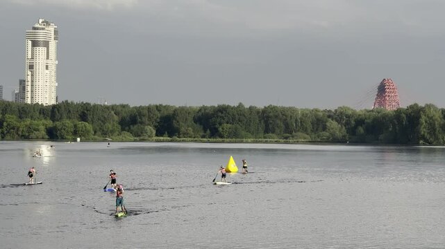 SUP boarders training on the water, competitions, Stroginsky Zaton, Moscow